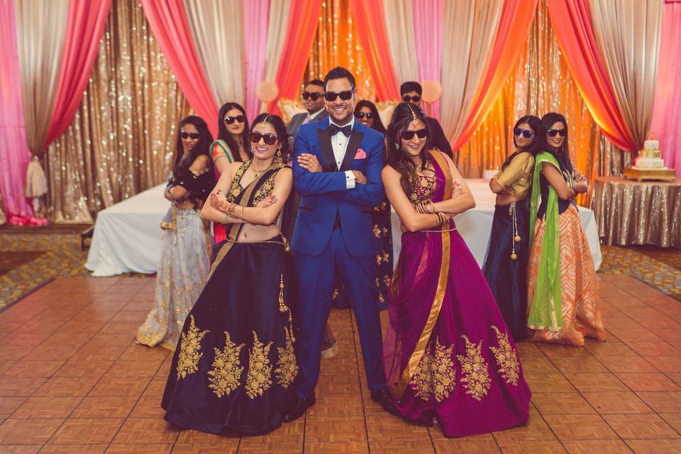 Groom with bridesmaids