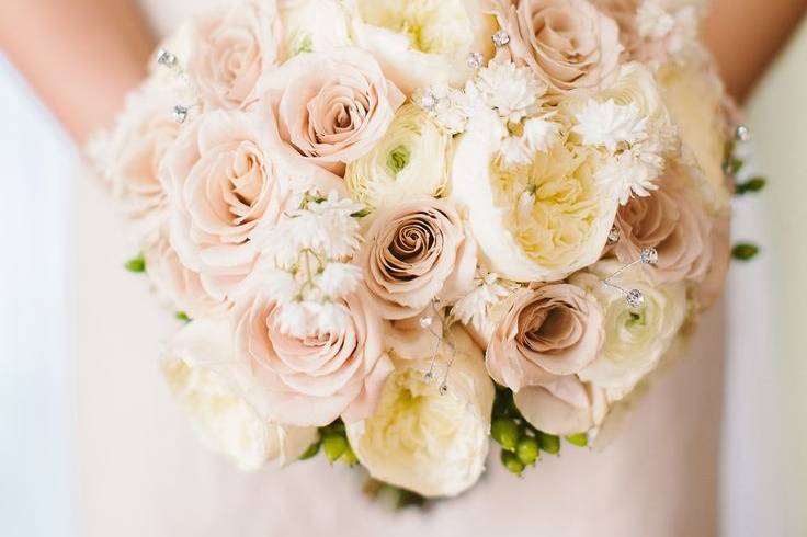 Bride and bridesmaids holding their bouquets