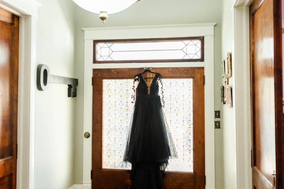 Dress hanging from doorway