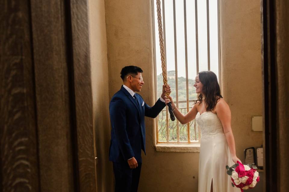 Couple ringing the bell