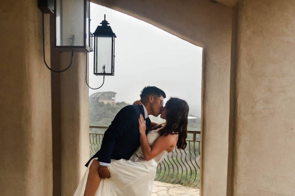 Couple kissing in hall