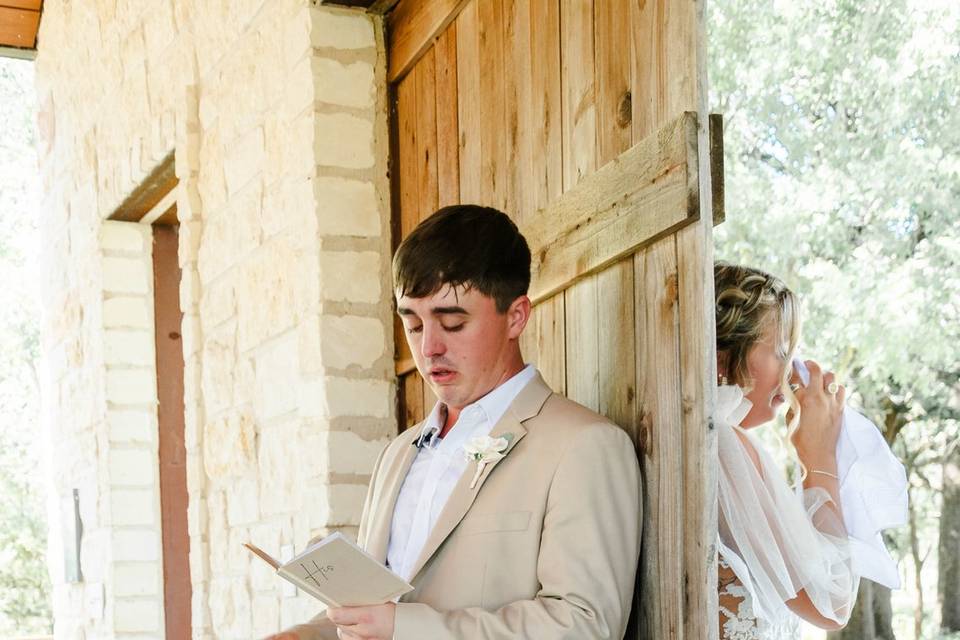 Couple reading personal vows