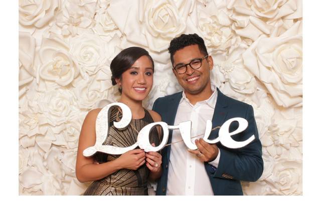 A custom White Floral Wall and a simple classic wedding theme for this beautiful couple.