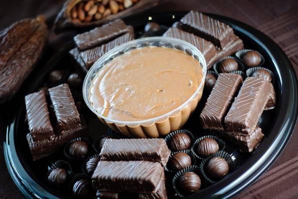 Party platter with enrobed brownies, chocolate mousse, and chocolate truffles.