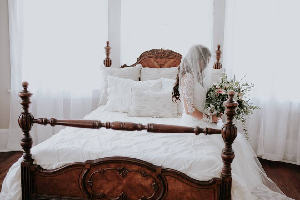 Bride on the bed | Connie Marina Photography