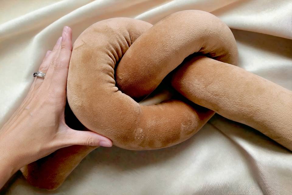 Pretzel knot pillow