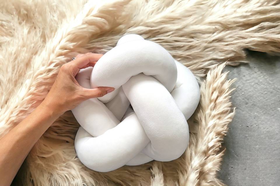 Button knot pillow