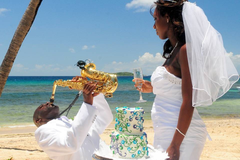 WOW! What a cool view of Saxophone Serenading the beautiful bride on a perfect wedding day at Bolongo Beach and Resort in St. Thomas USVI! Simply unforgettable!