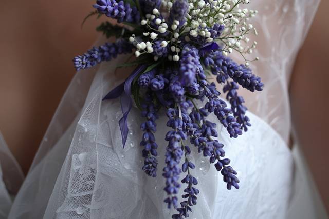 Corsage with lots of lavender stems and some baby's breath.jpg