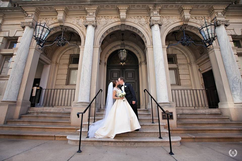 Couple kissing at the steps