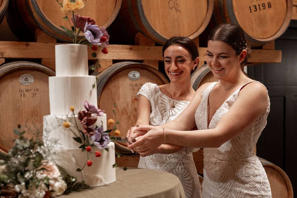 Cutting cake at the barrels