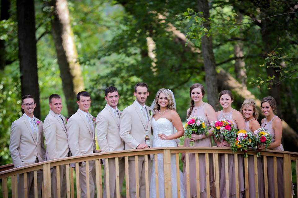 The couple with the bridesmaids and groomsmen