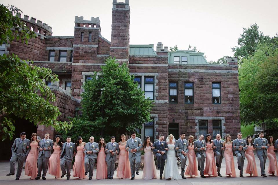 The couple with the bridesmaids and groomsmen