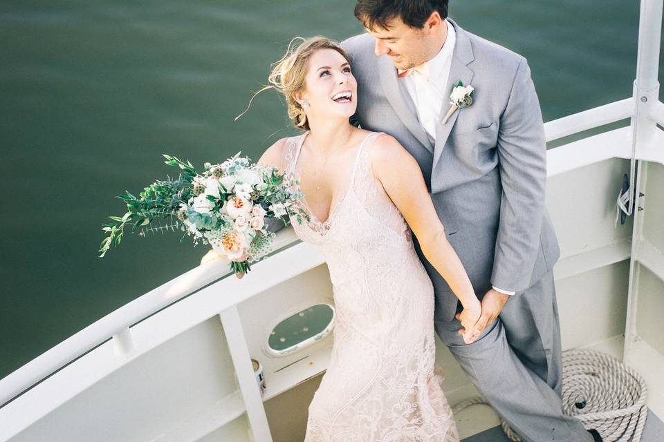 Wedding by the yacht | Photo: Sean Cook