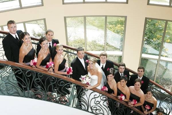 Bridal Party on staircase. Photo credit: Alamo Photographic