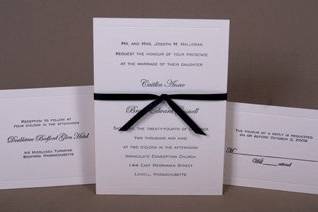 Close-up of pocketfold centerpiece.  2-color letterpressed on Crane's Lettra (110#) and mounted on black cardstock.