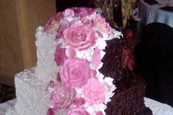 Wedding cake with figurines on top