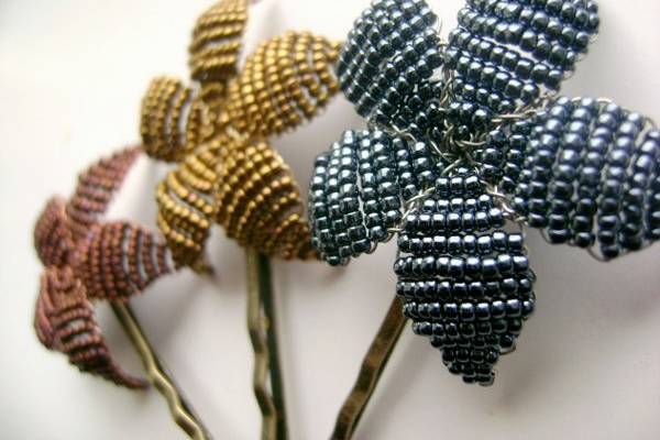 A trio of beaded flowers on bobby pins. You can customize these in any colour ans as many as you like.