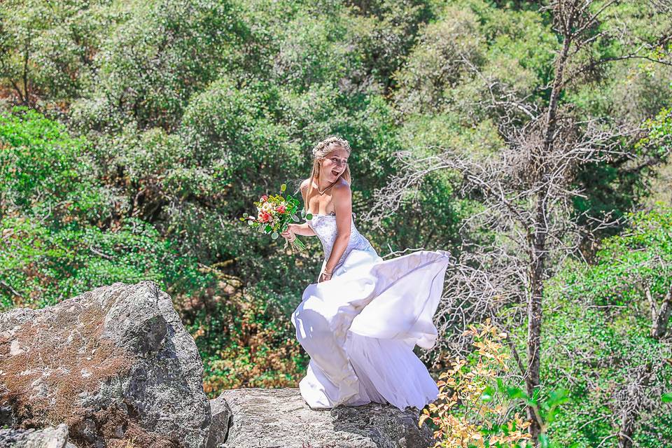 Twirling Bride at the boulder