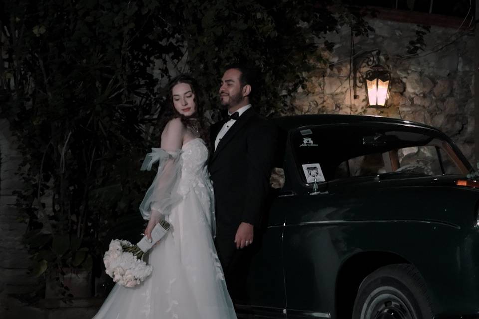 Couple with vintage car