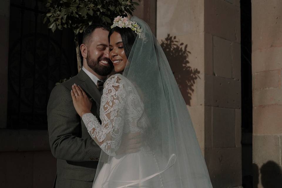 Bride and groom hugging