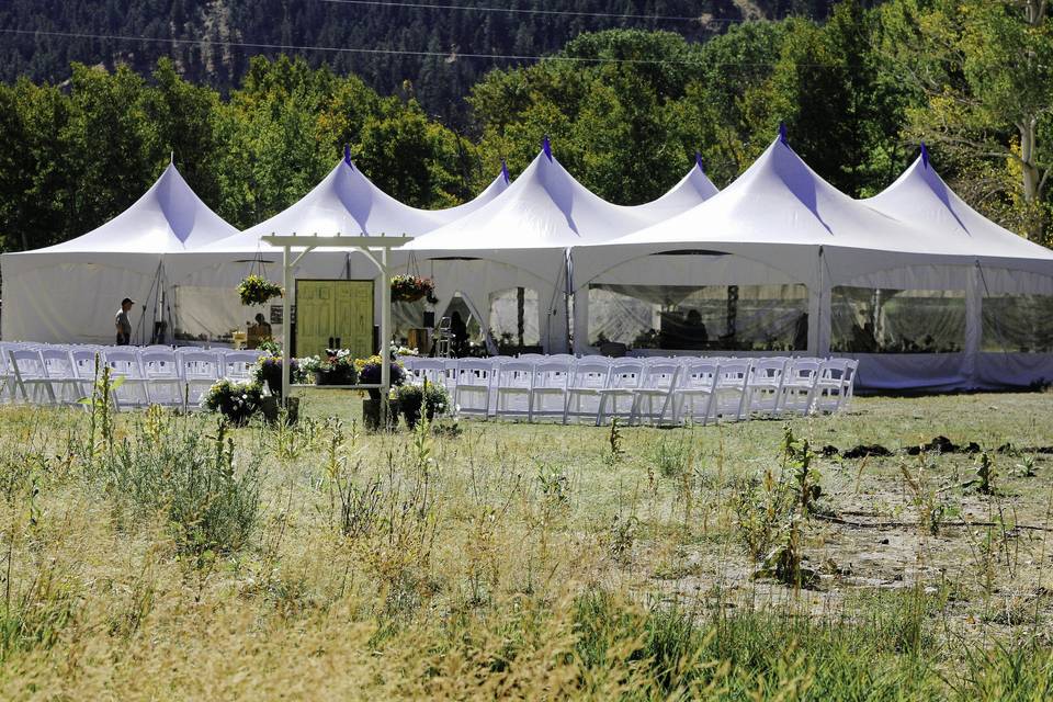 Reception tent and outdoor ceremony setup
