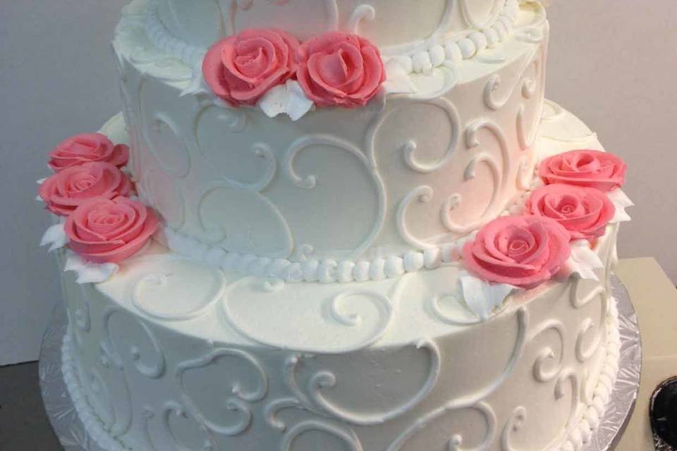 Wedding cake with pink flowers