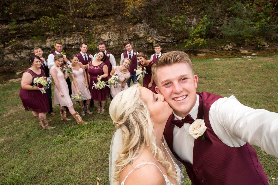 Couple with bridesmaids and groomsmen