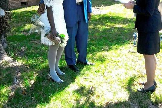 Marriage Ceremony under the magnolia tree in front of the Historic Levy Count Courthouse