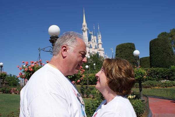 Ceremony in the Rose Garden of the Magic Kingdom with the Castle in the background.  Very romantic!