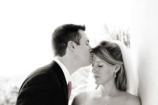 Groom kissing bride