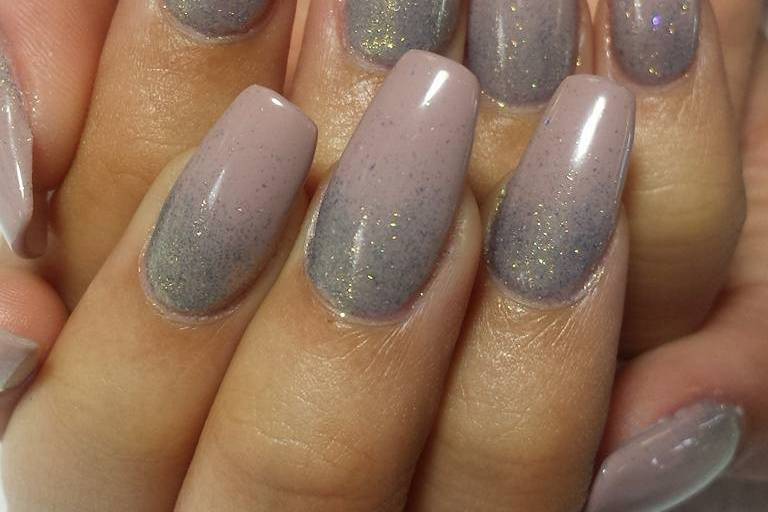 Full set ballerina shaped nails with a subtle sparkle ombre