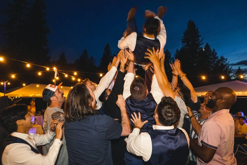 Groom crowd surfing