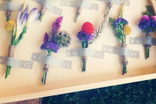 Boutonniere's by Karma Flowers