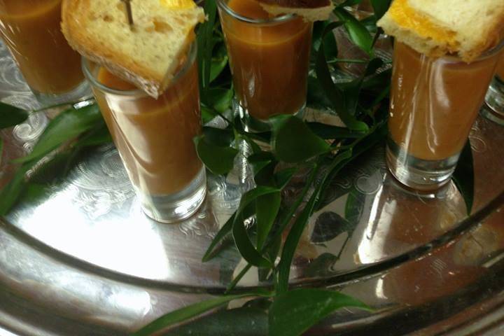 Roasted tomato bisque shooters with mini grilled cheese.