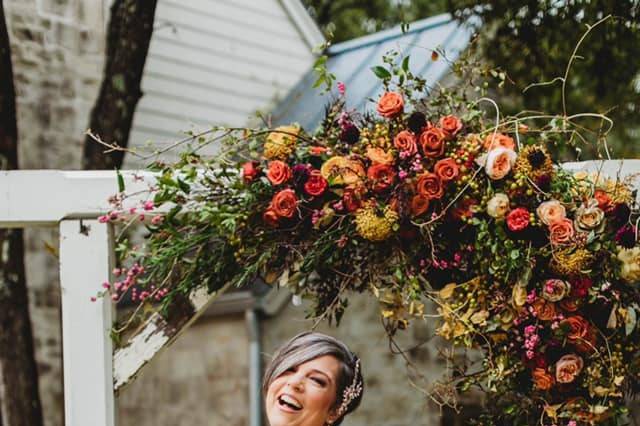 Bouquet with bright orange and pinks