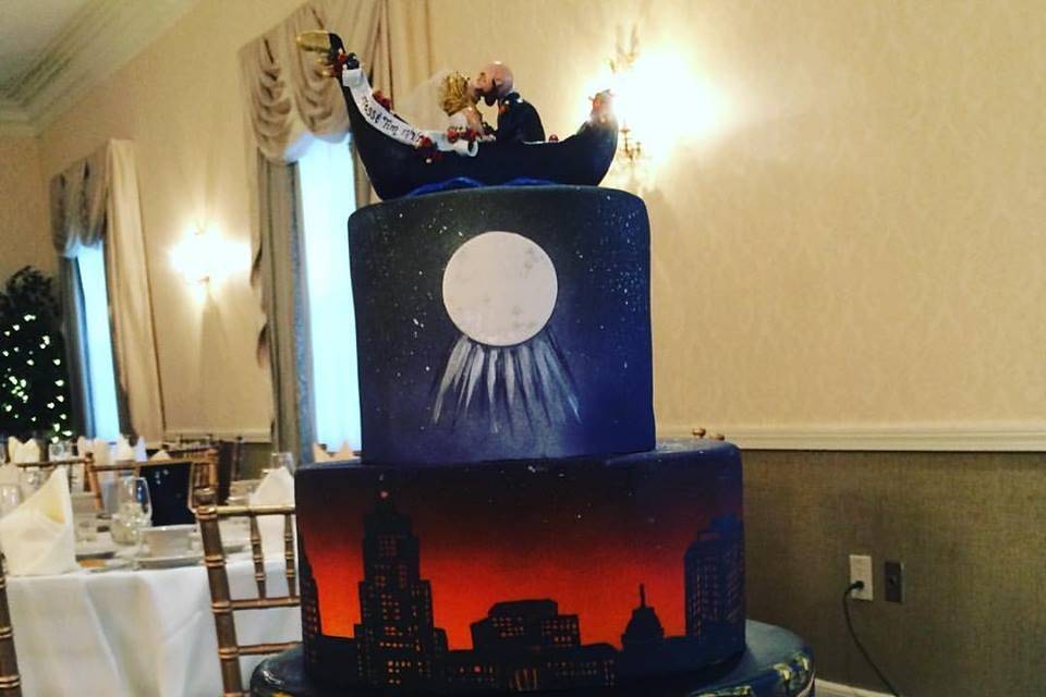 Painted Waterfire cake with custom made topper