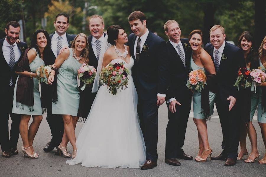 The couple with the bridesmaids and groomsmen