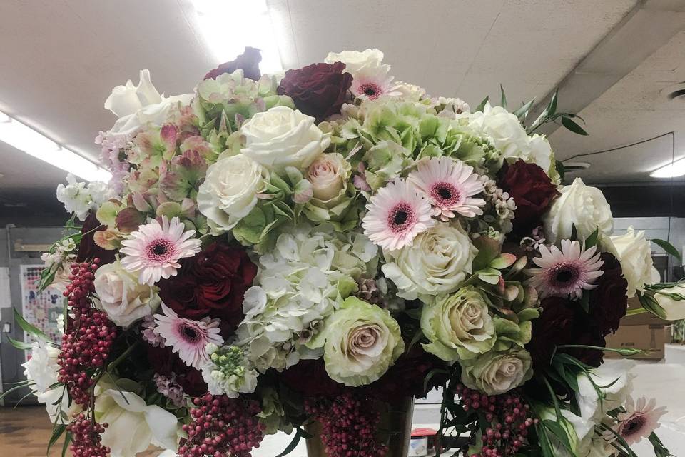 Our designers at work on a church alter arrangement for a beautiful ceremony