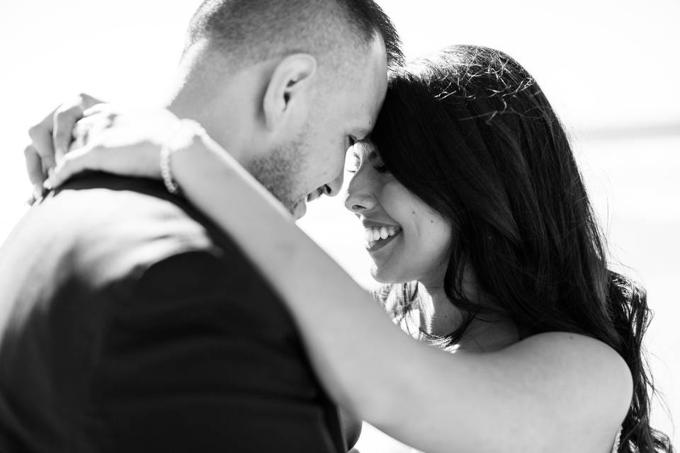 Bride & groom touching heads