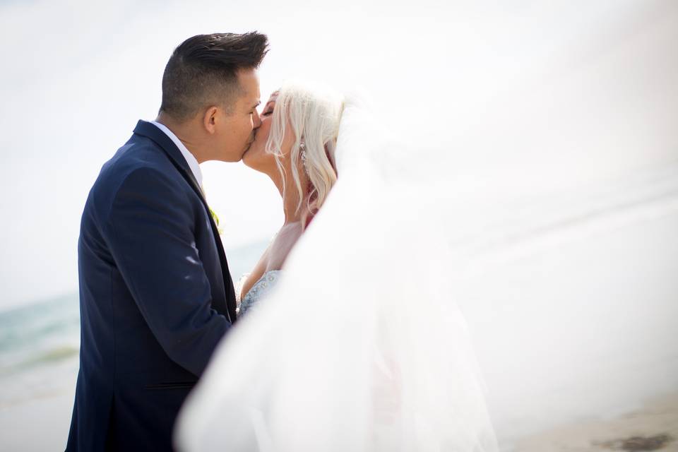 Beautiful kiss behind veil