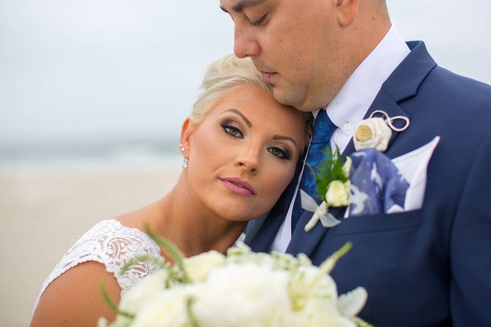 Brides head on grooms chest