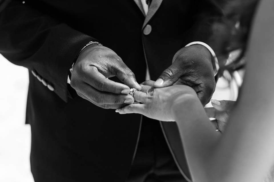 Groom putting on ring