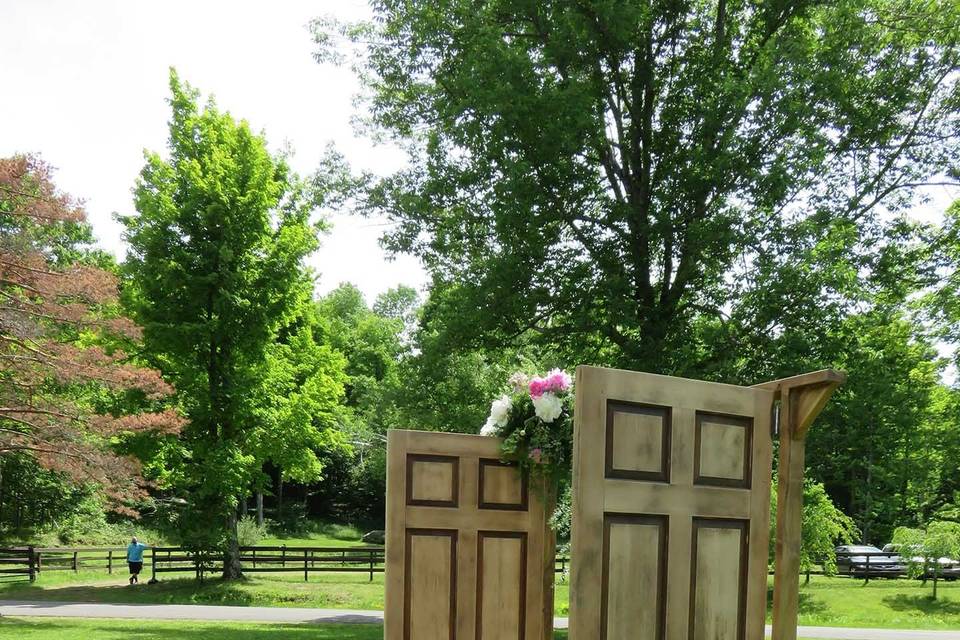 Wooden doors that open and close to create an outdoor church effect.