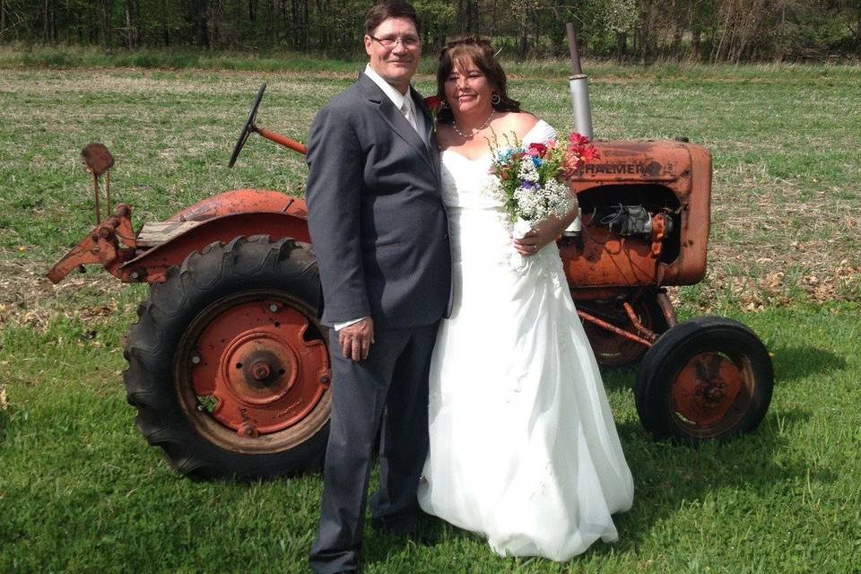 Couple by a tractor