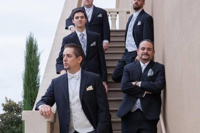 Groom and groomsmen on the stairs