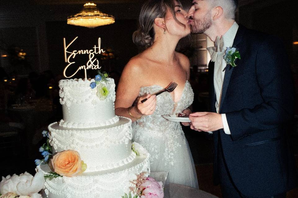 Cake cutting wedding photo