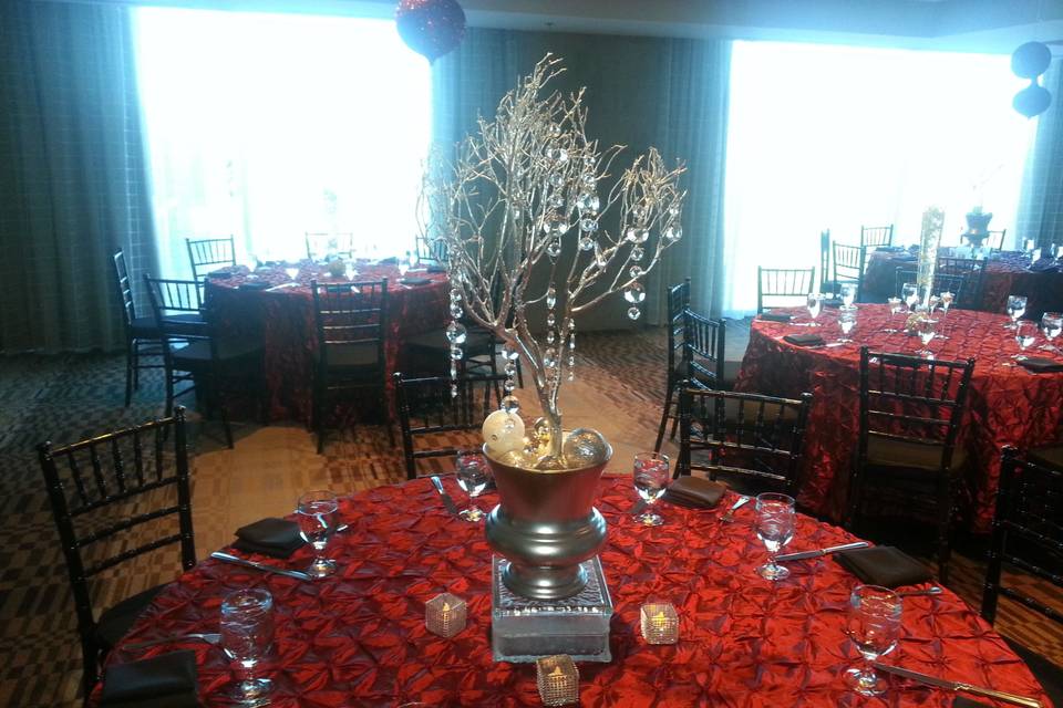 Red table setup with centerpiece
