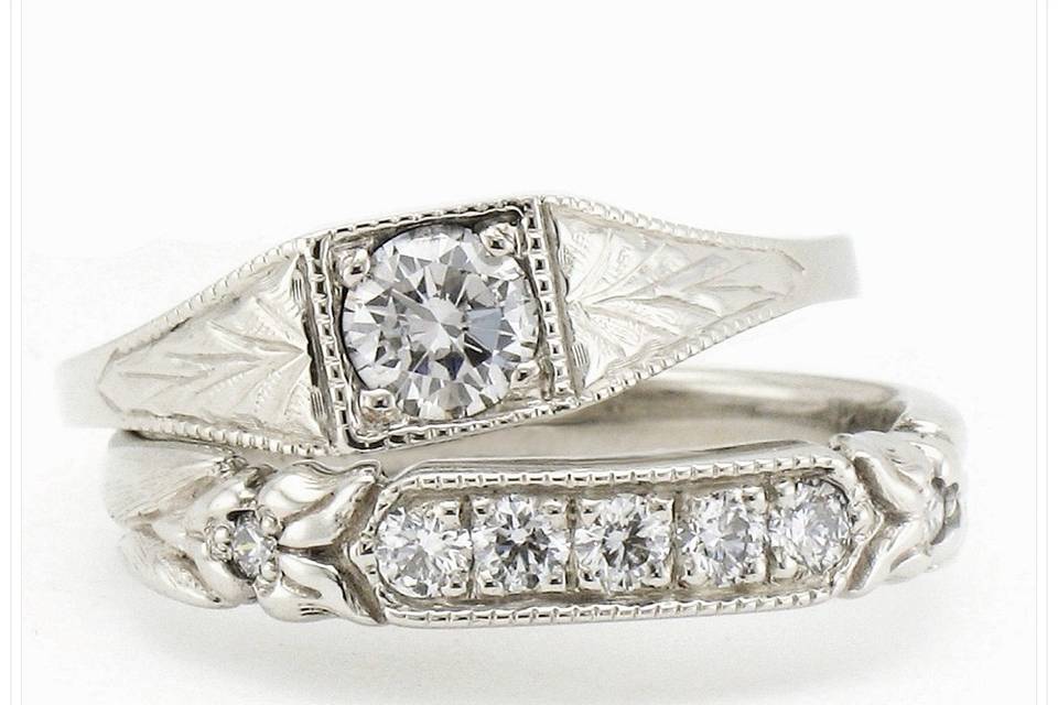 Hand-engraved Wedding Ring Set by Larry Pauling for The Jewelbox in Ithaca, NY -  available in different precious metals, and with a variety of gems.