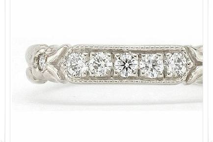 Hand-engraved Diamond Band by Larry Pauling for The Jewelbox in Ithaca, NY - available in different precious metals, and with a variety of gems.